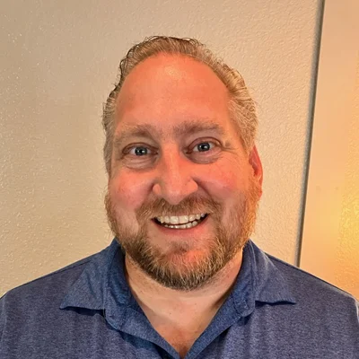 A headshot photo of Dr. Paul Beck